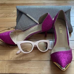 Hot pink kitten heels with gold toes and peekaboo plastic detail